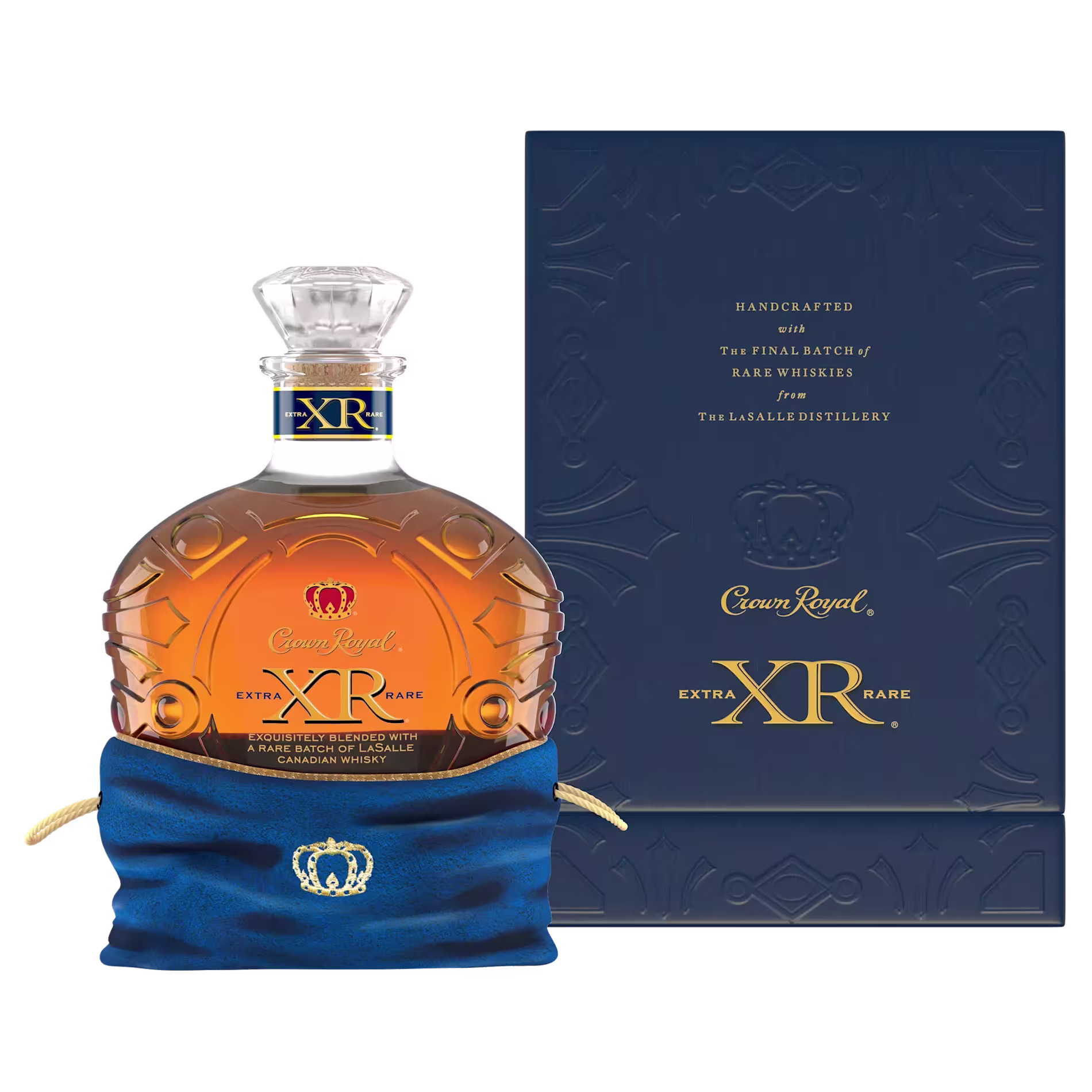 A bottle of Crown Royal XR Extra Rare Canadian whisky in a blue velvet pouch, shown next to its matching blue and gold gift box.