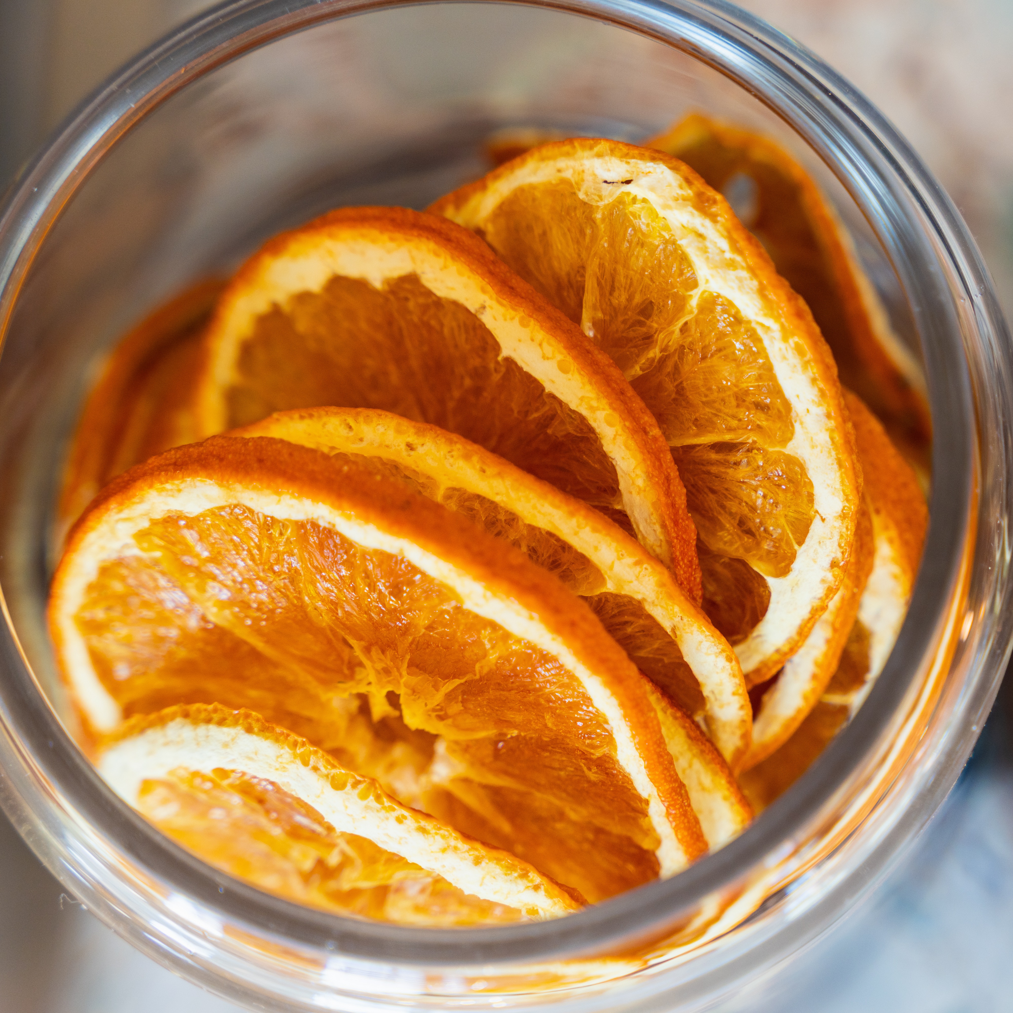 Dried citrus fruit slices in glass jars from above