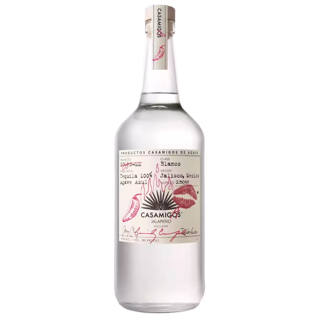 A bottle of Casamigos Jalapeño Tequila 100% agave, featuring a clear liquid, a beige label with red accents, and a wooden-topped cork against a plain background.