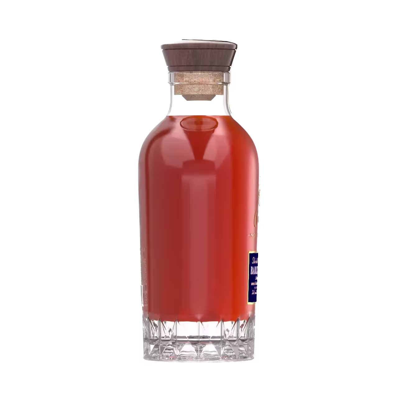 A clear glass decanter filled with an orange liquid, sealed with a cork stopper, displayed against a plain black background.