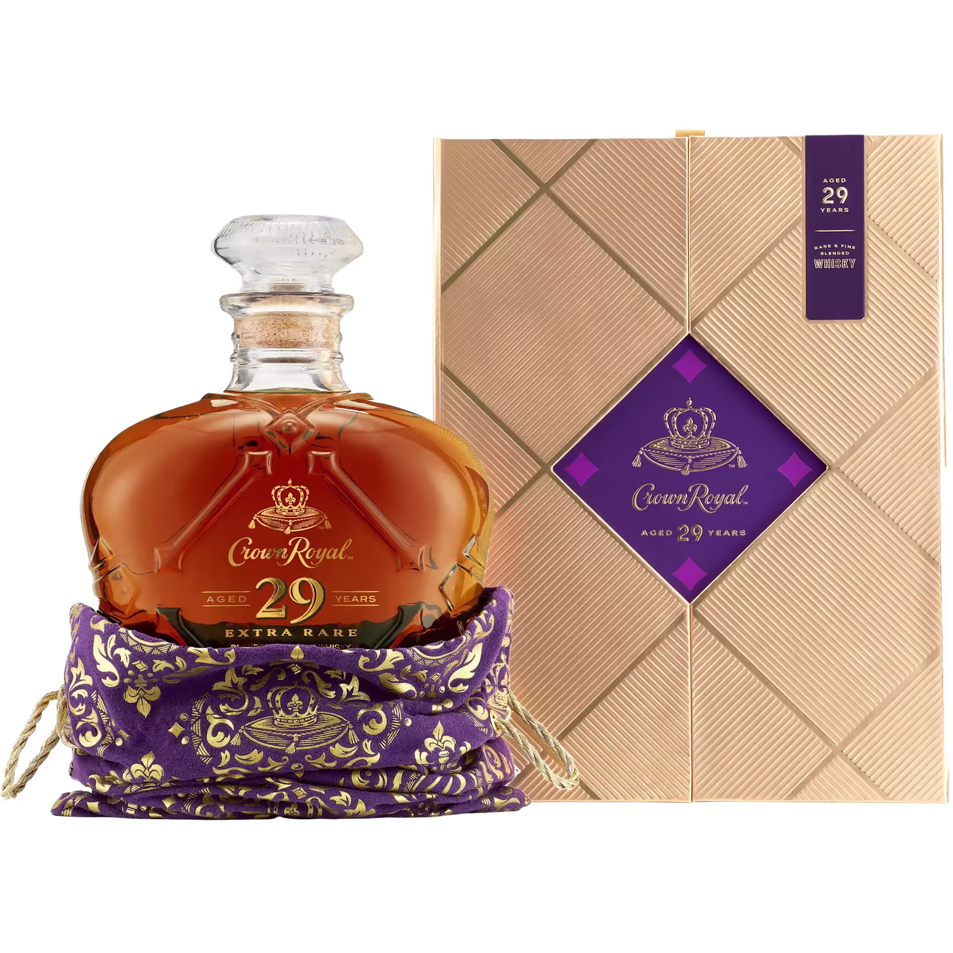 Crown Royal 29 Year Old Extra Rare whisky in a glass decanter with a purple and gold pouch, next to its gold and purple gift box.