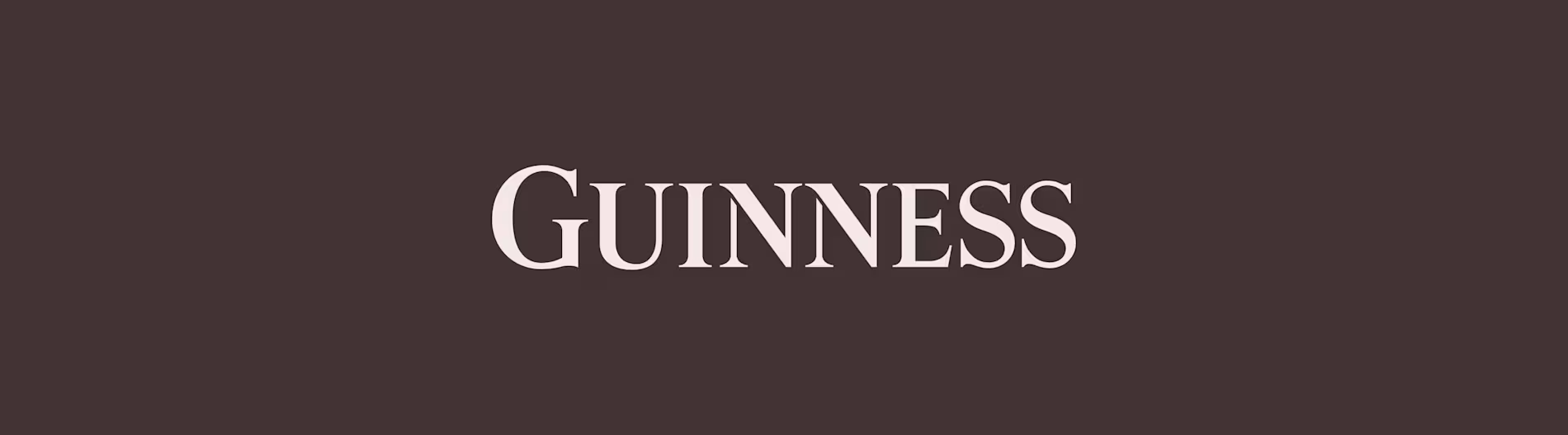 Guinness stout logo in white on dark brown background