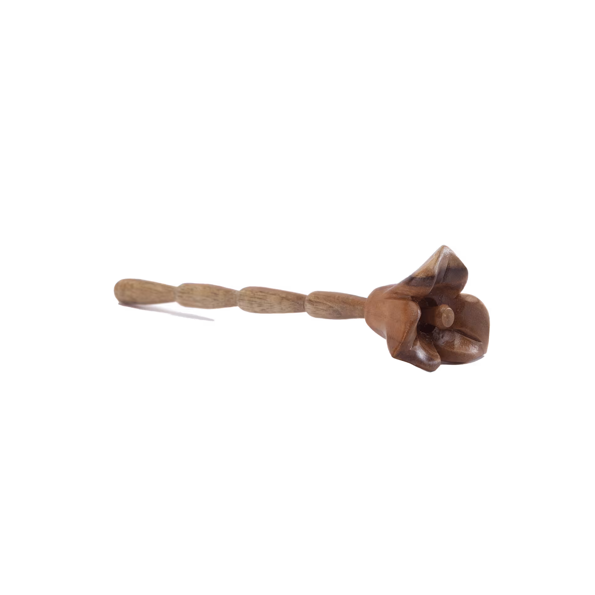 A carved wooden stick with a flower-shaped end, photographed on a plain white background.