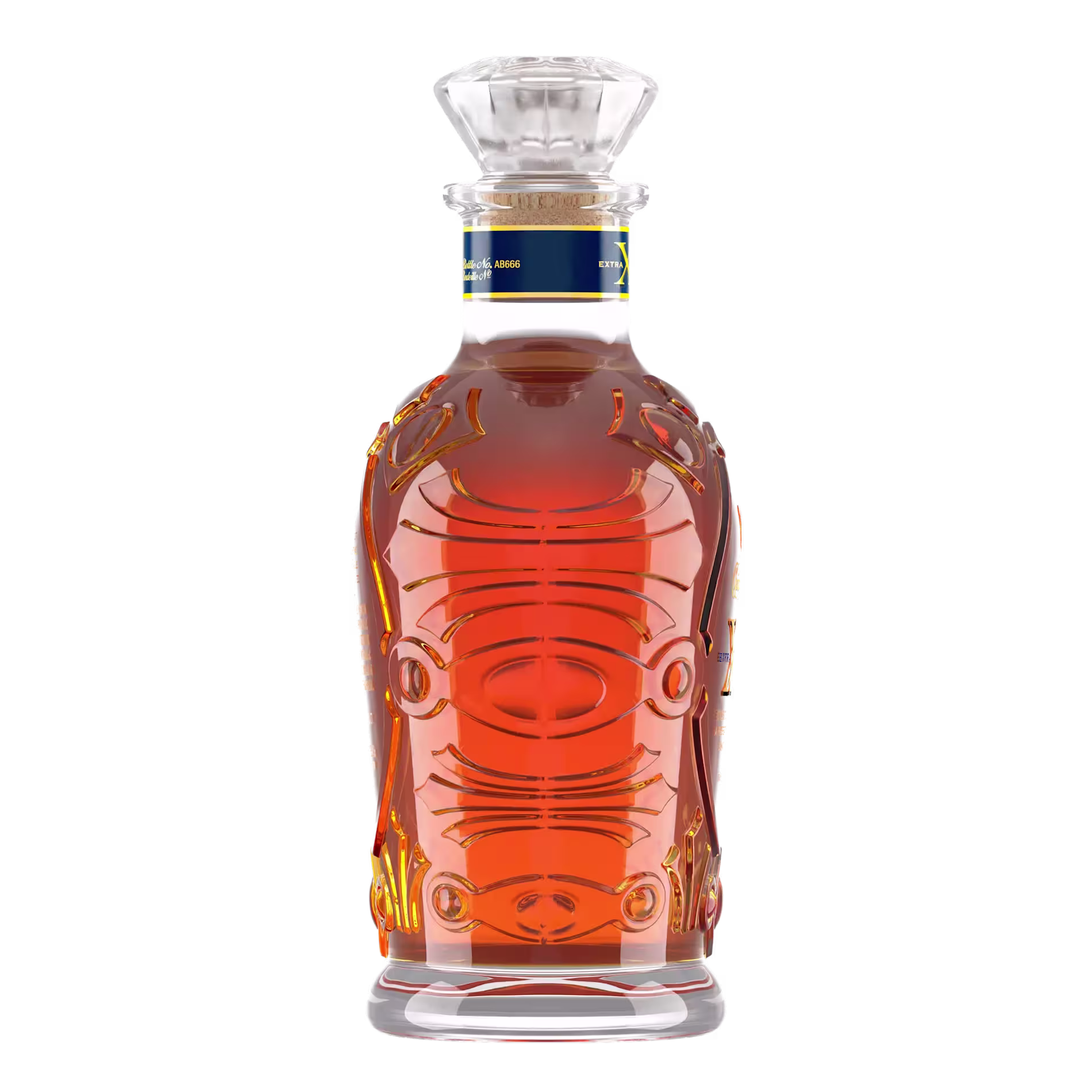 A clear, engraved glass decanter filled with amber-colored liquid, topped with a faceted glass stopper, set against a plain background.