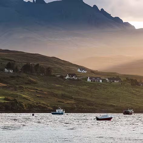 Water splashing against large rocks within Scotch whisky region
