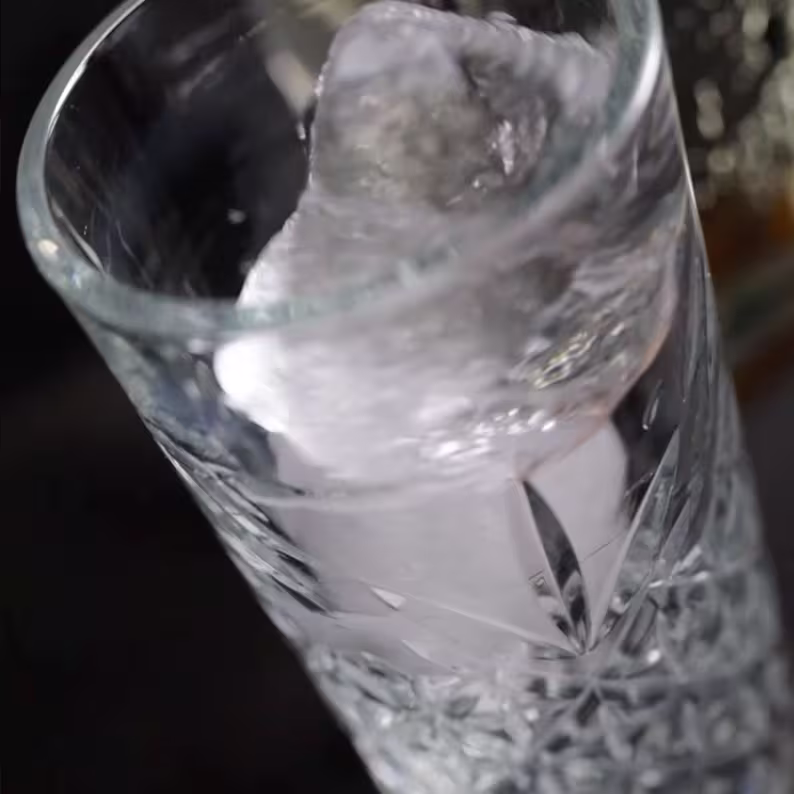 Mix ice with cocktail ingredients in a glass