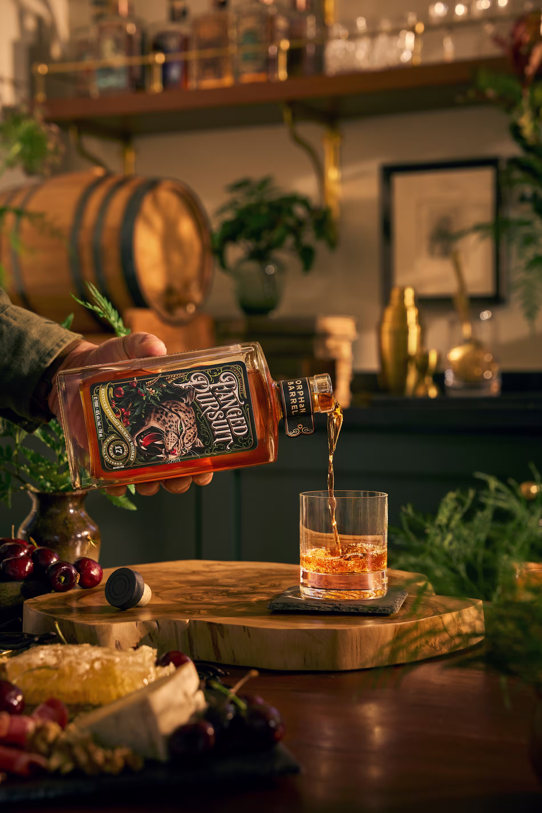 Orphan Barrel whiskey bottles displayed in a rustic setting, highlighting rare and aged bourbons.