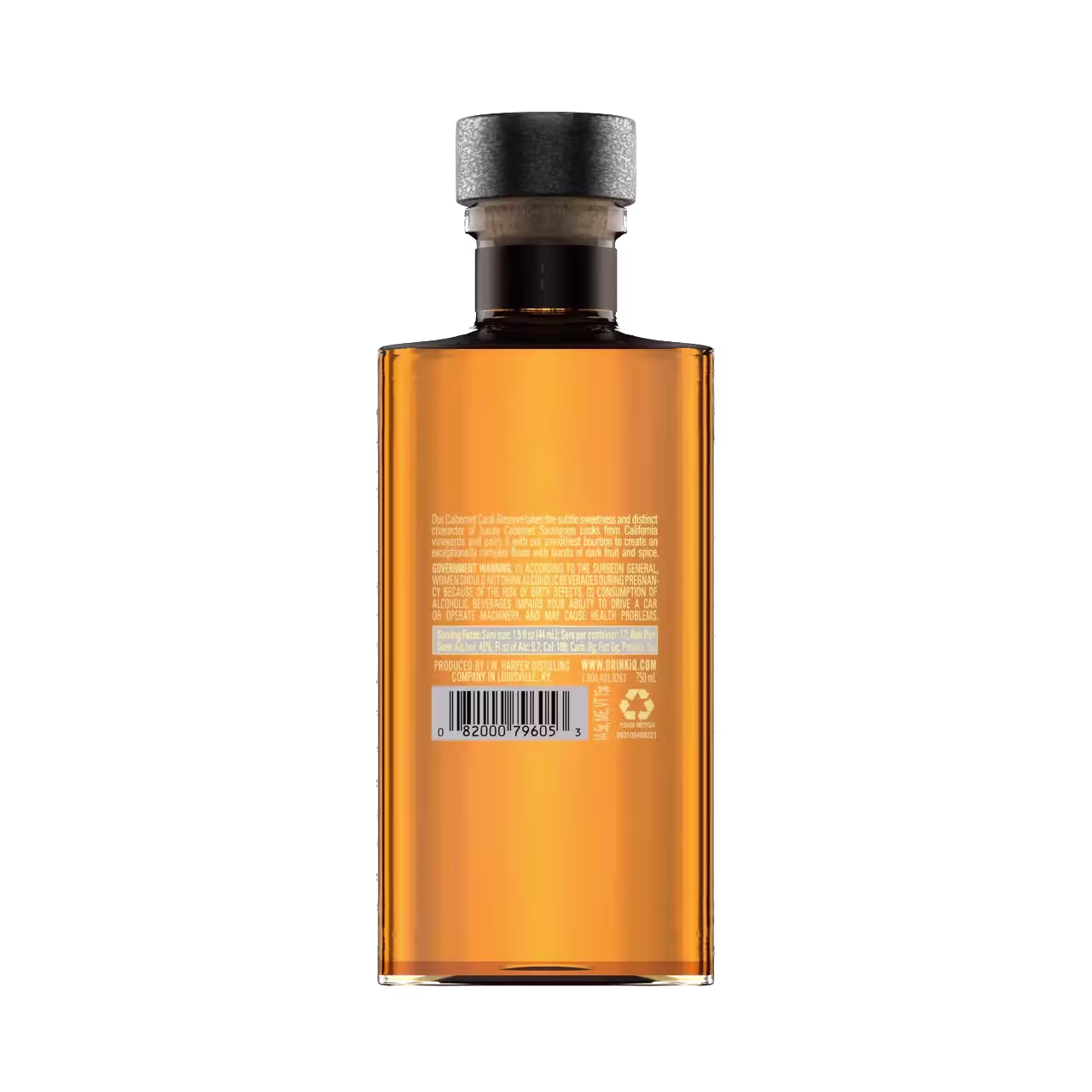 A rectangular amber-colored bottle with a black cap is shown from the back, displaying a white label with text, a barcode, and recycling symbols.