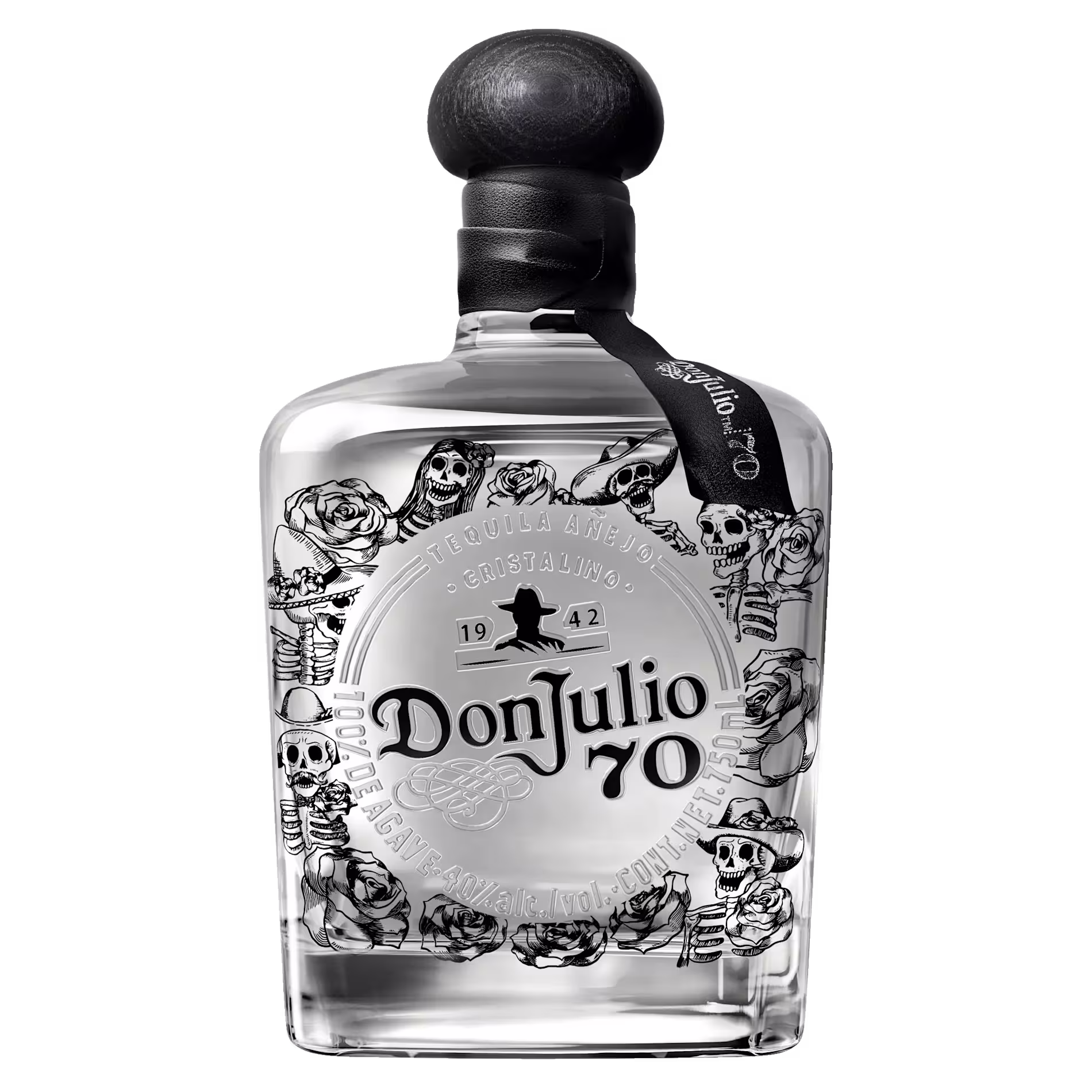 A clear bottle of Don Julio 70 tequila featuring black-and-white illustrations of roses and skeletons on the label, with a black ribbon tied around the neck.