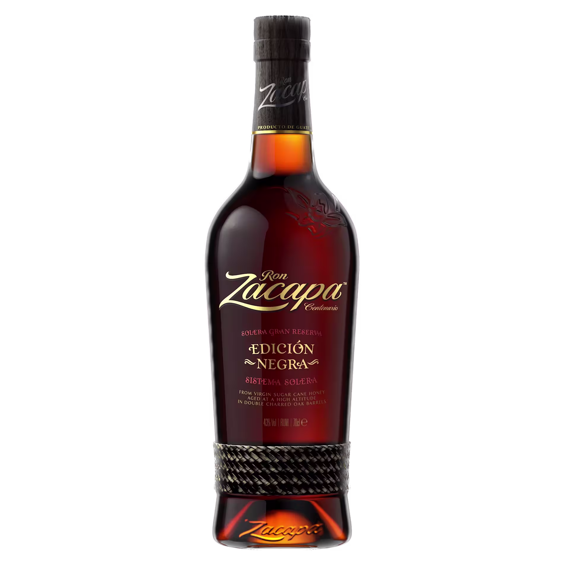 A bottle of Ron Zacapa Edición Negra rum with gold lettering and a black woven band around the lower half.