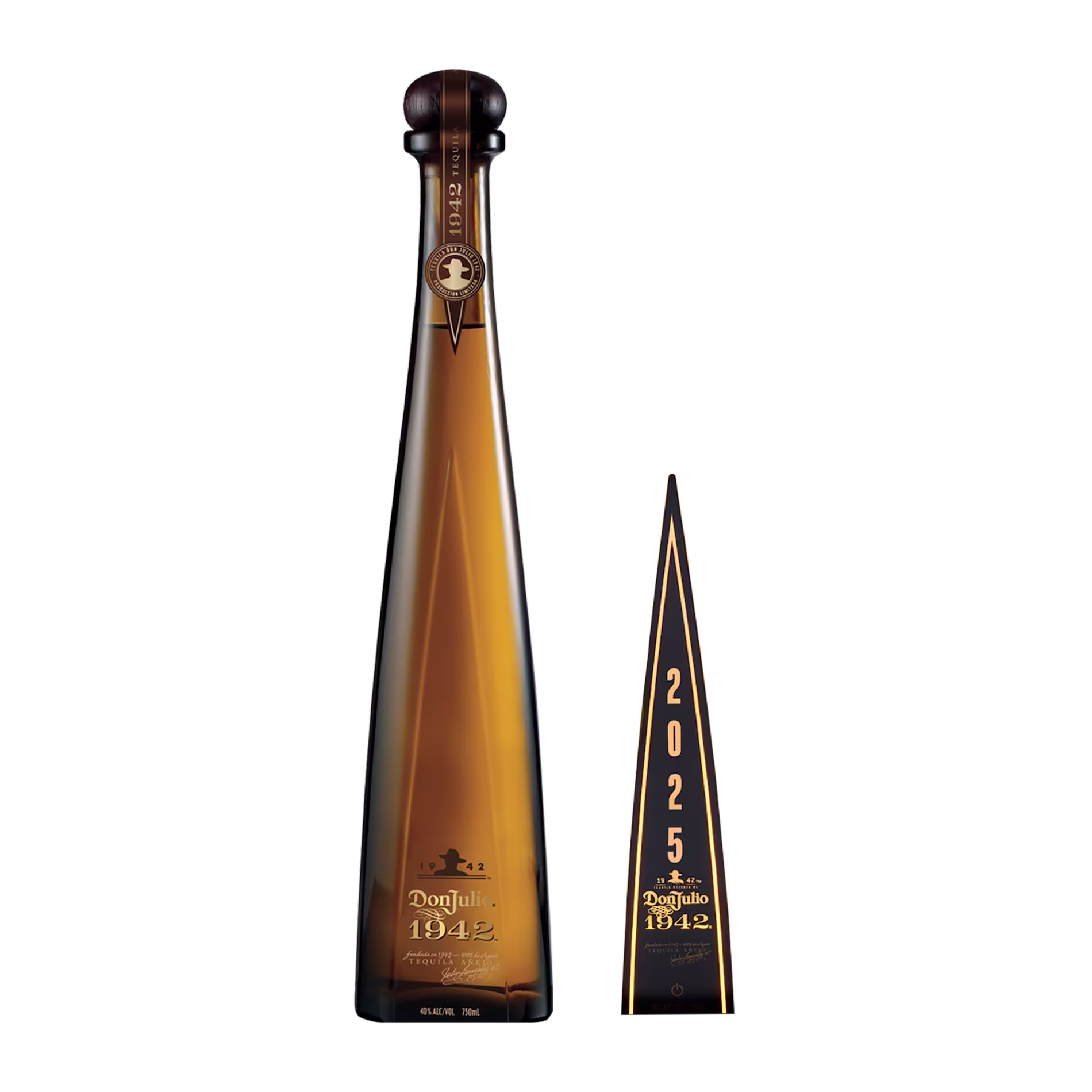 A tall, amber-colored bottle of Don Julio 1942 tequila stands next to a black and gold triangular display marked 2025.