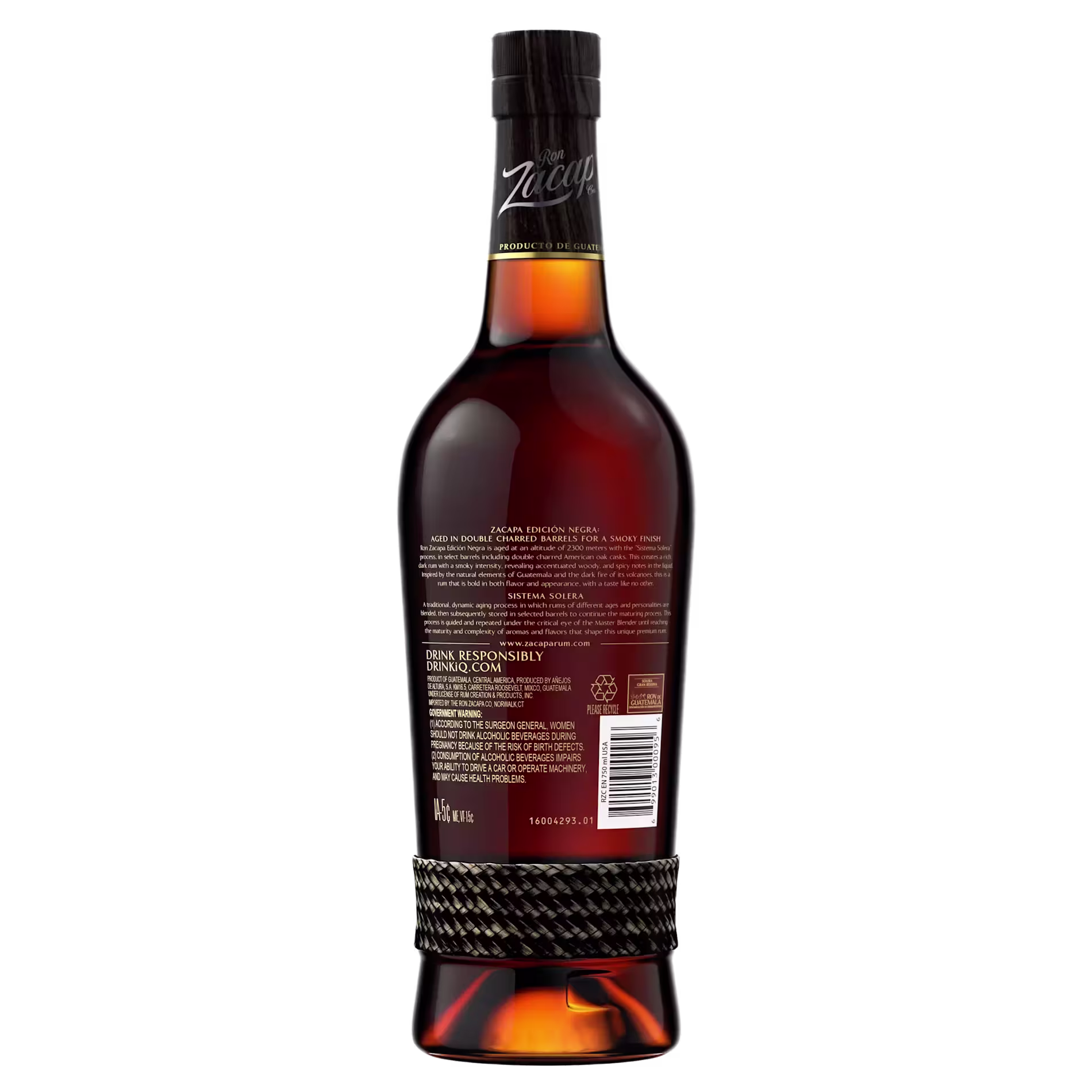 A bottle of Ron Zacapa rum shown from the back, displaying the label with product information and a barcode, against a black background.