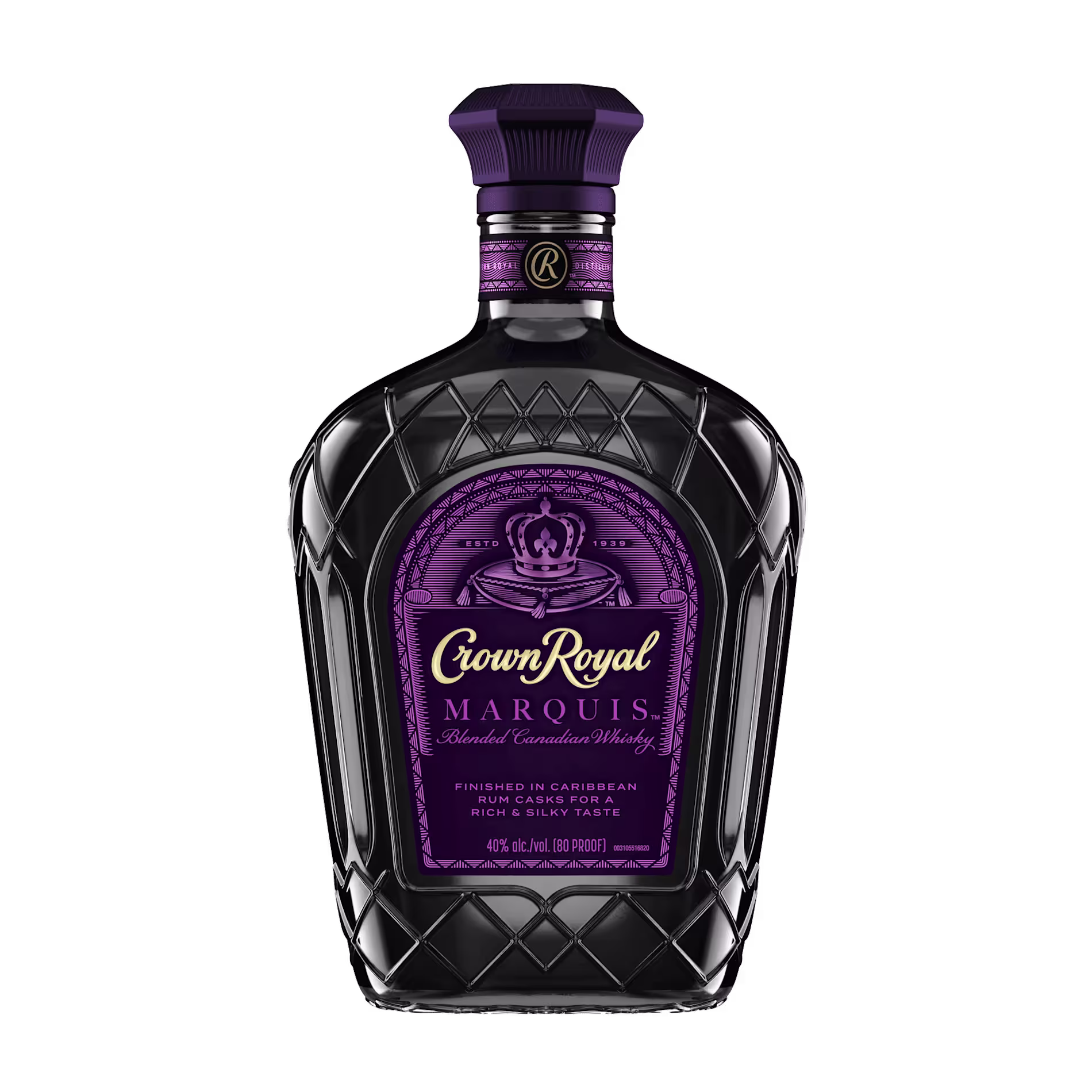 A bottle of Crown Royal Marquis blended Canadian whisky with a purple label and cap, featuring decorative embossing on the glass.