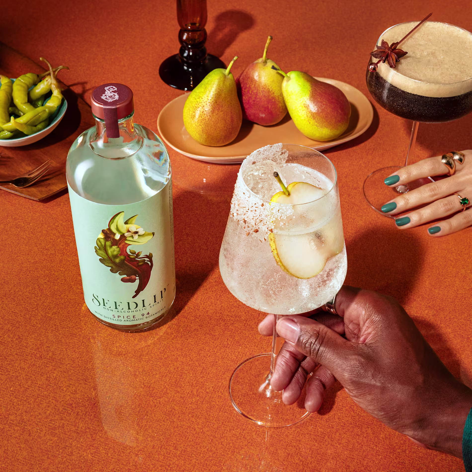 Seedlip Spice 94 Alcohol Free Spirit served with pear garnish in a cocktail glass