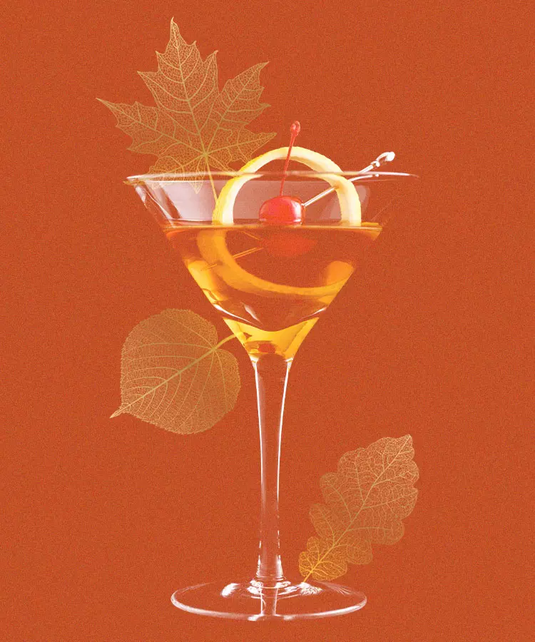 A martini glass filled with amber liquid, garnished with a lemon twist and cherry, set against an orange background with translucent leaf illustrations.