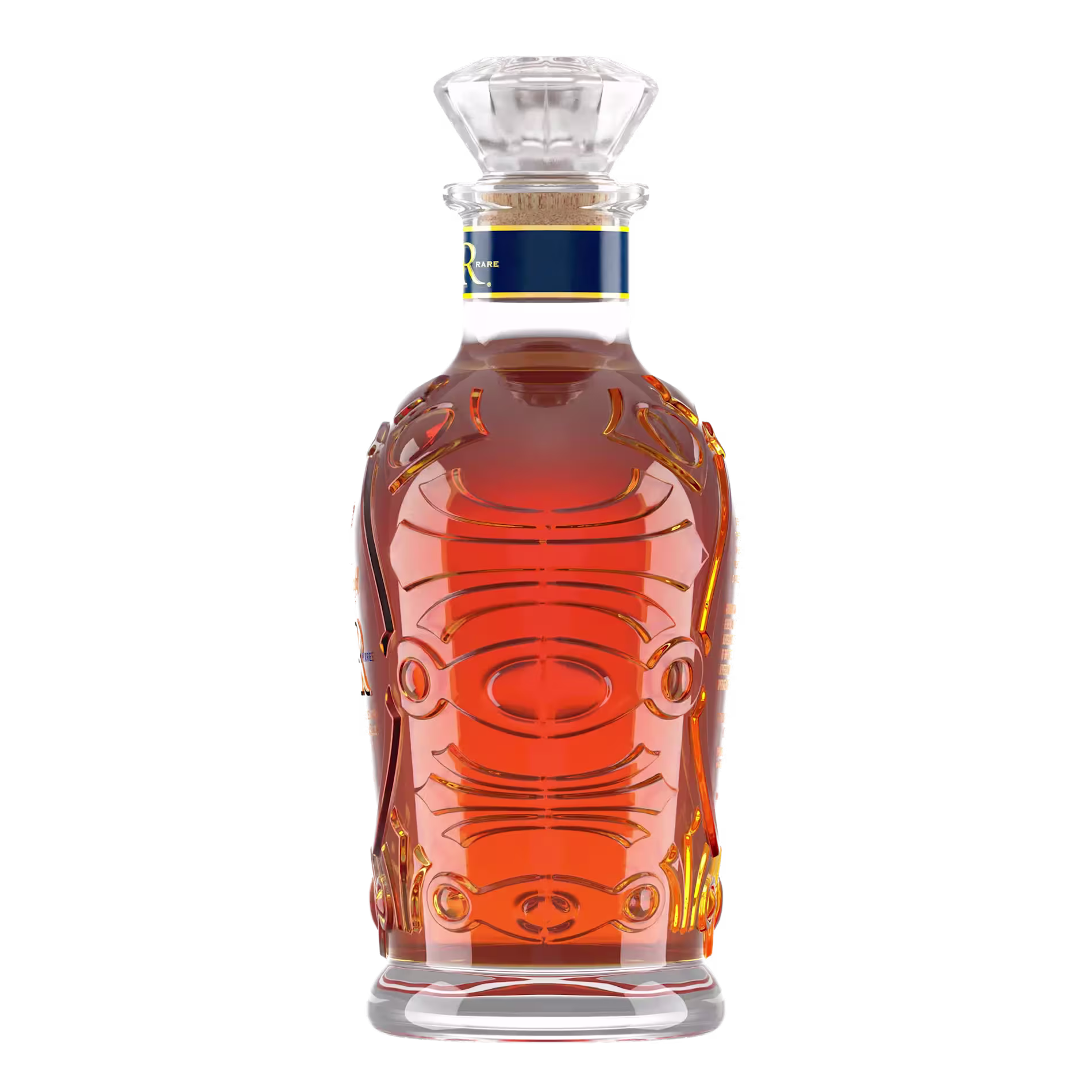 A clear glass decanter filled with amber liquid, featuring intricate etched designs and a faceted stopper on top.