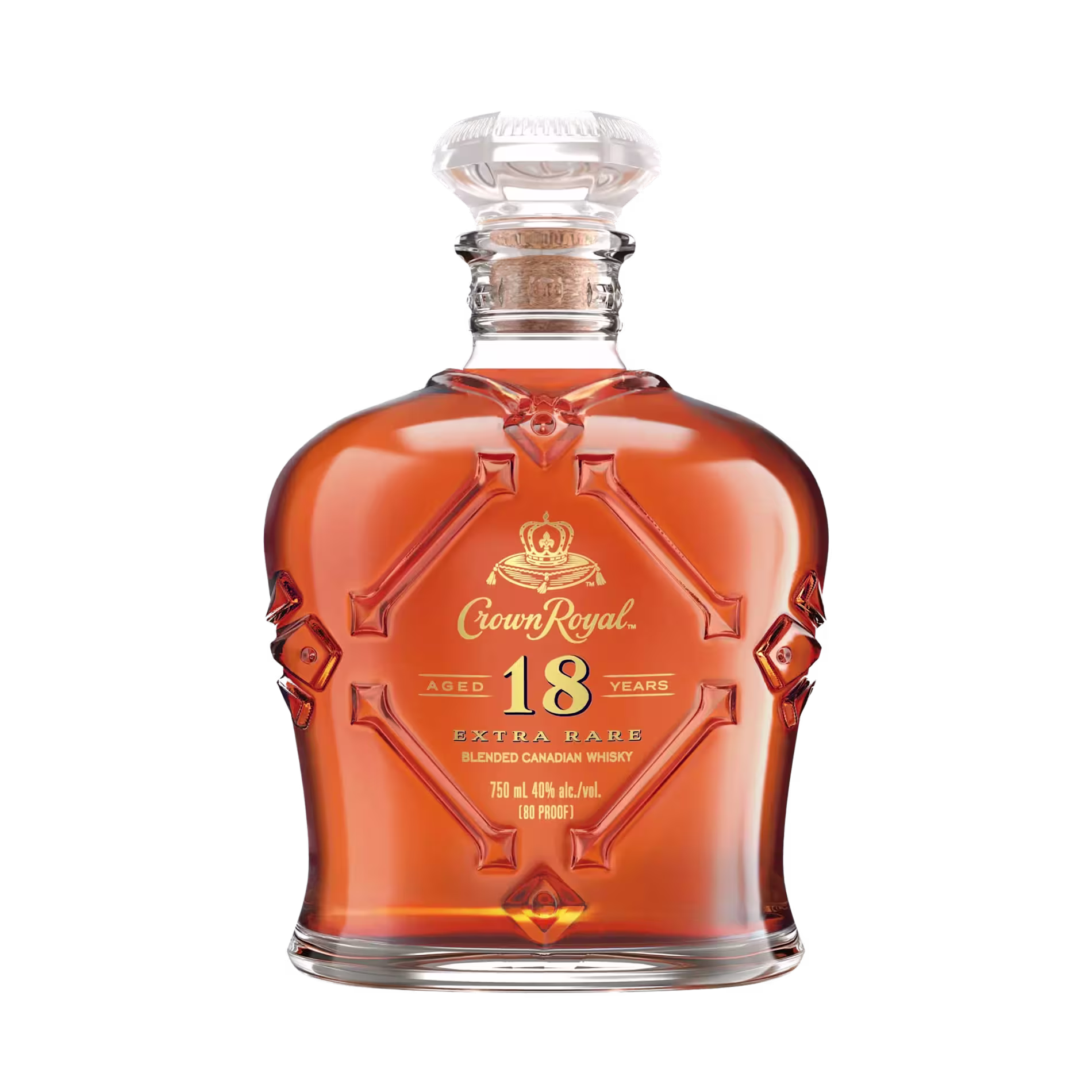 A bottle of Crown Royal 18 Year Extra Rare Blended Canadian Whisky with amber liquid, gold label, and a decorative glass stopper.