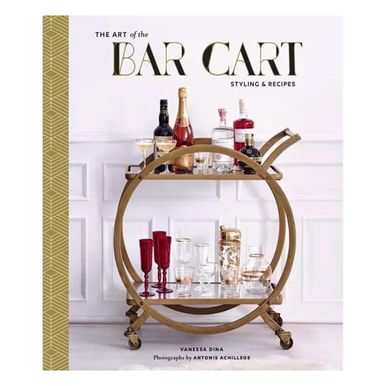 Book cover for The Art of the Bar Cart featuring a gold circular bar cart with assorted bottles, decanters, and glassware against a white wall background.