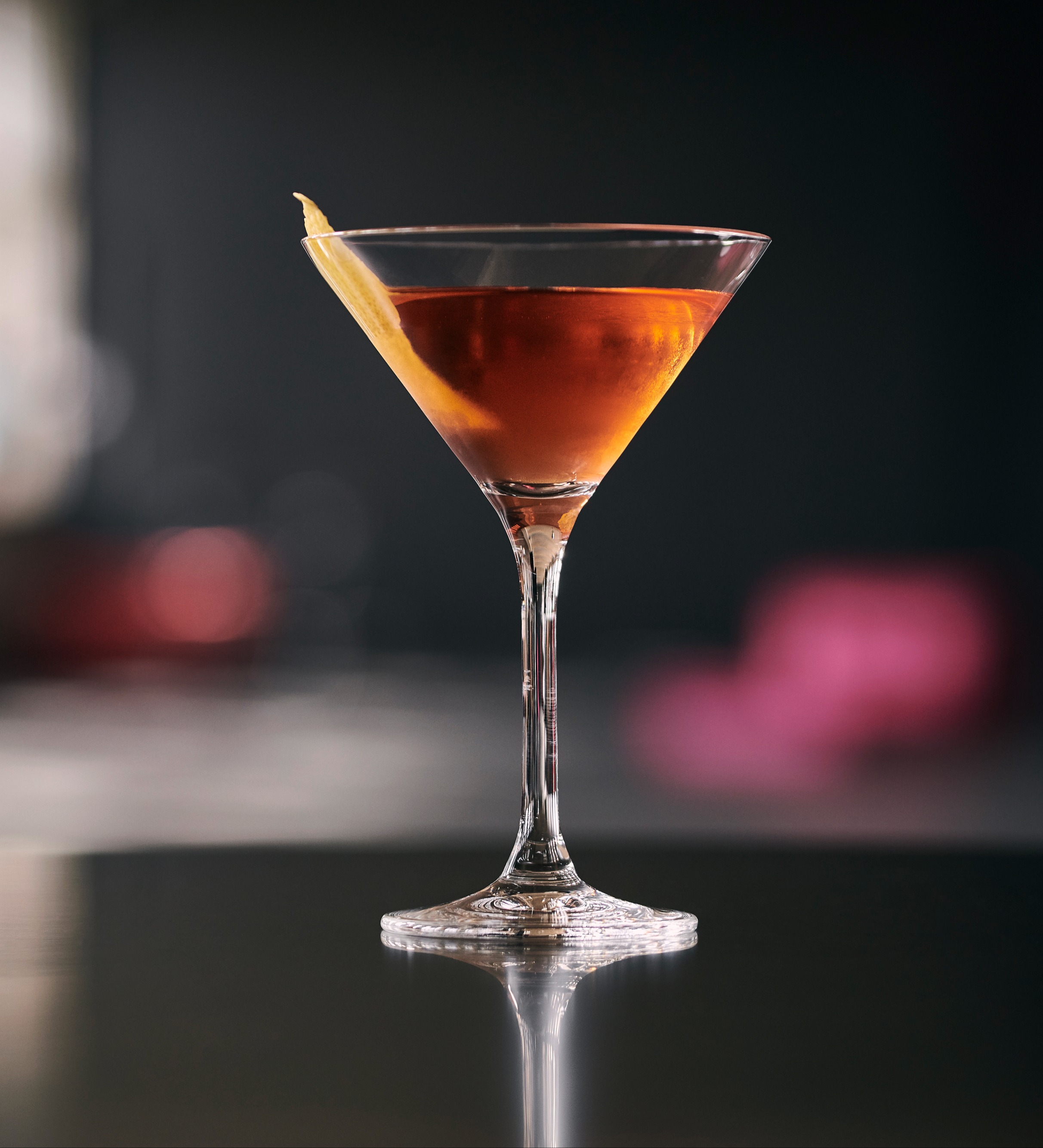 Blood and Sand cocktail made with Orphan Barrel whiskey, served in a coupe glass.