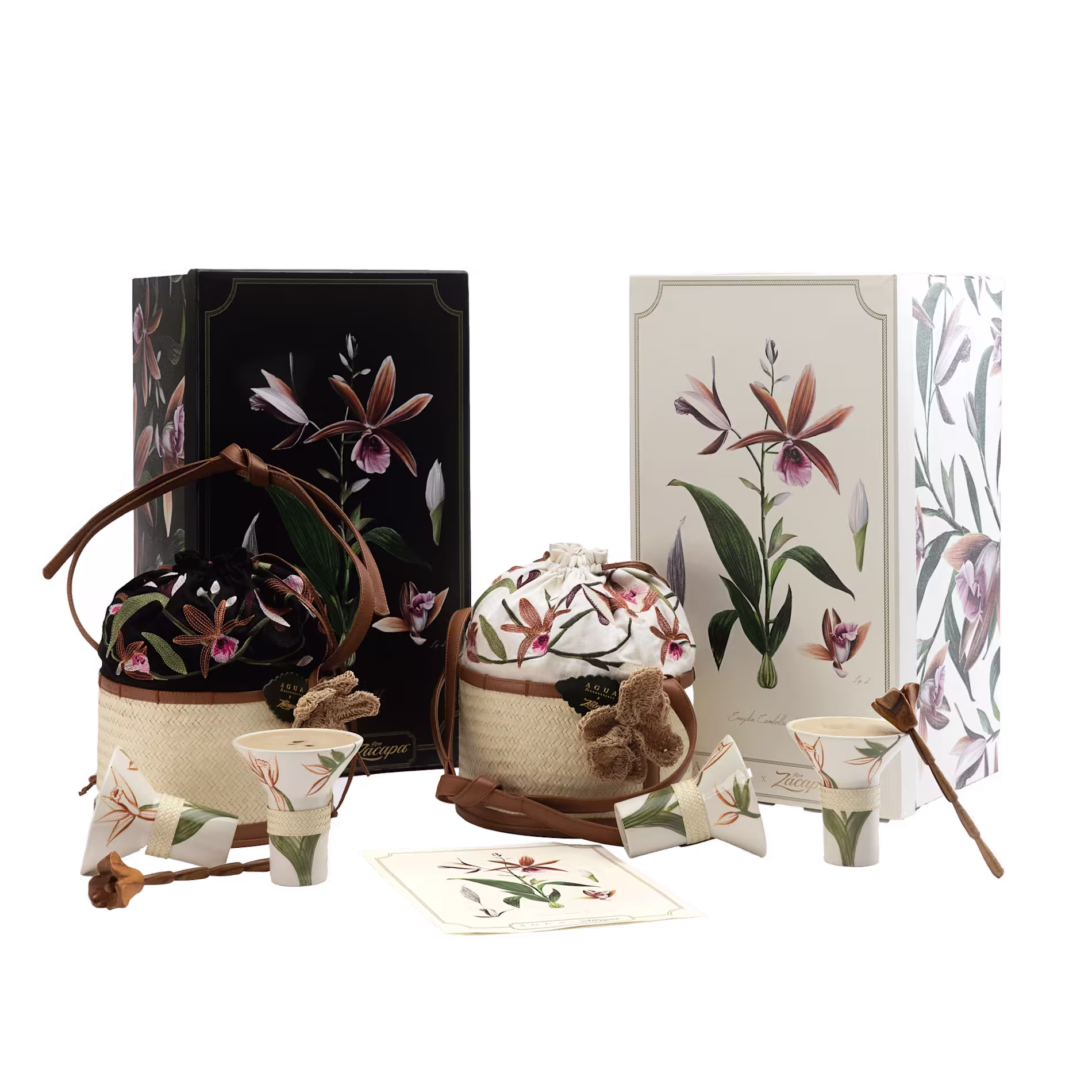 Two floral-themed gift sets with matching boxes, drawstring pouches, cups, and paper flowers, displayed on a white background.