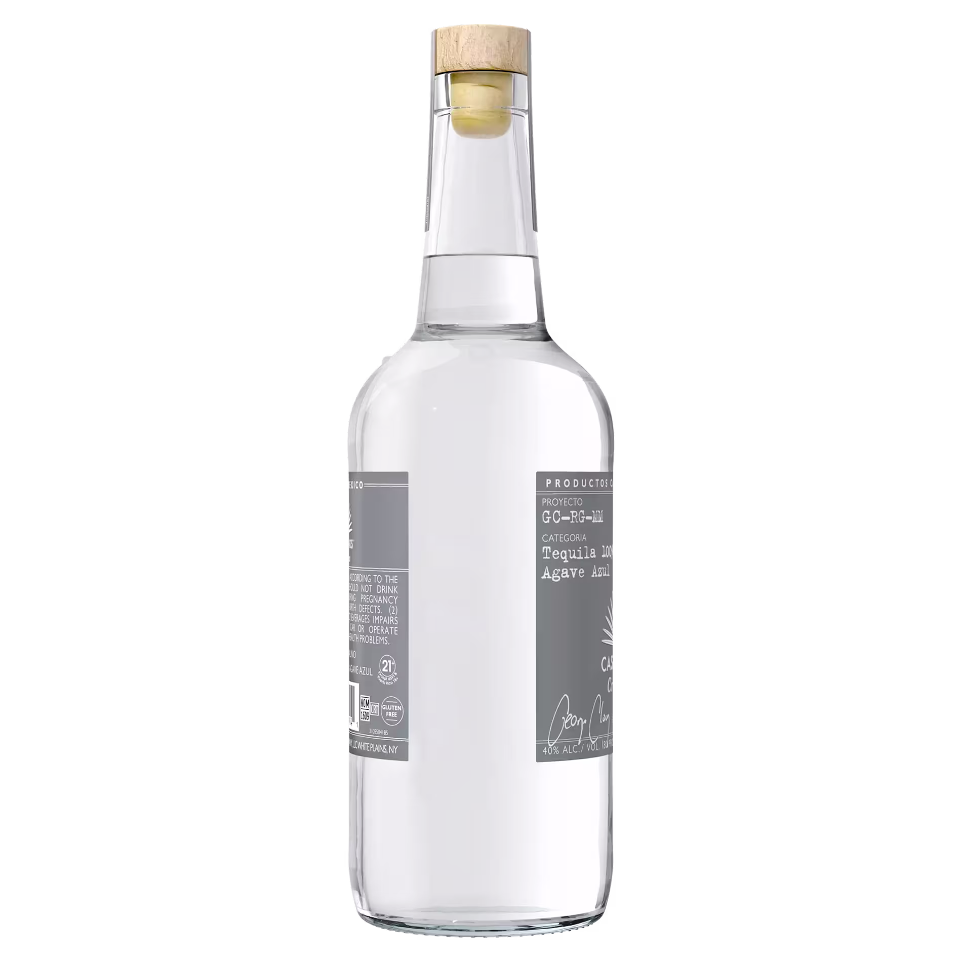A clear glass bottle of tequila with a wooden cork, featuring a gray label with white text on the back.