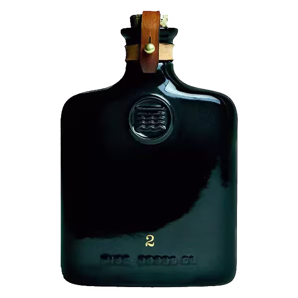 A black ceramic bottle with a brown leather strap and brass button at the top, featuring embossed and gold markings on the front.