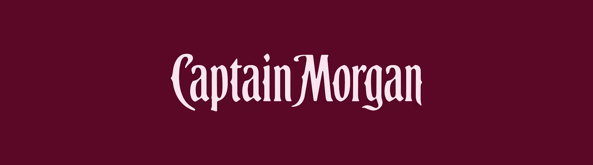 Captain Morgan rum logo in white on maroon background