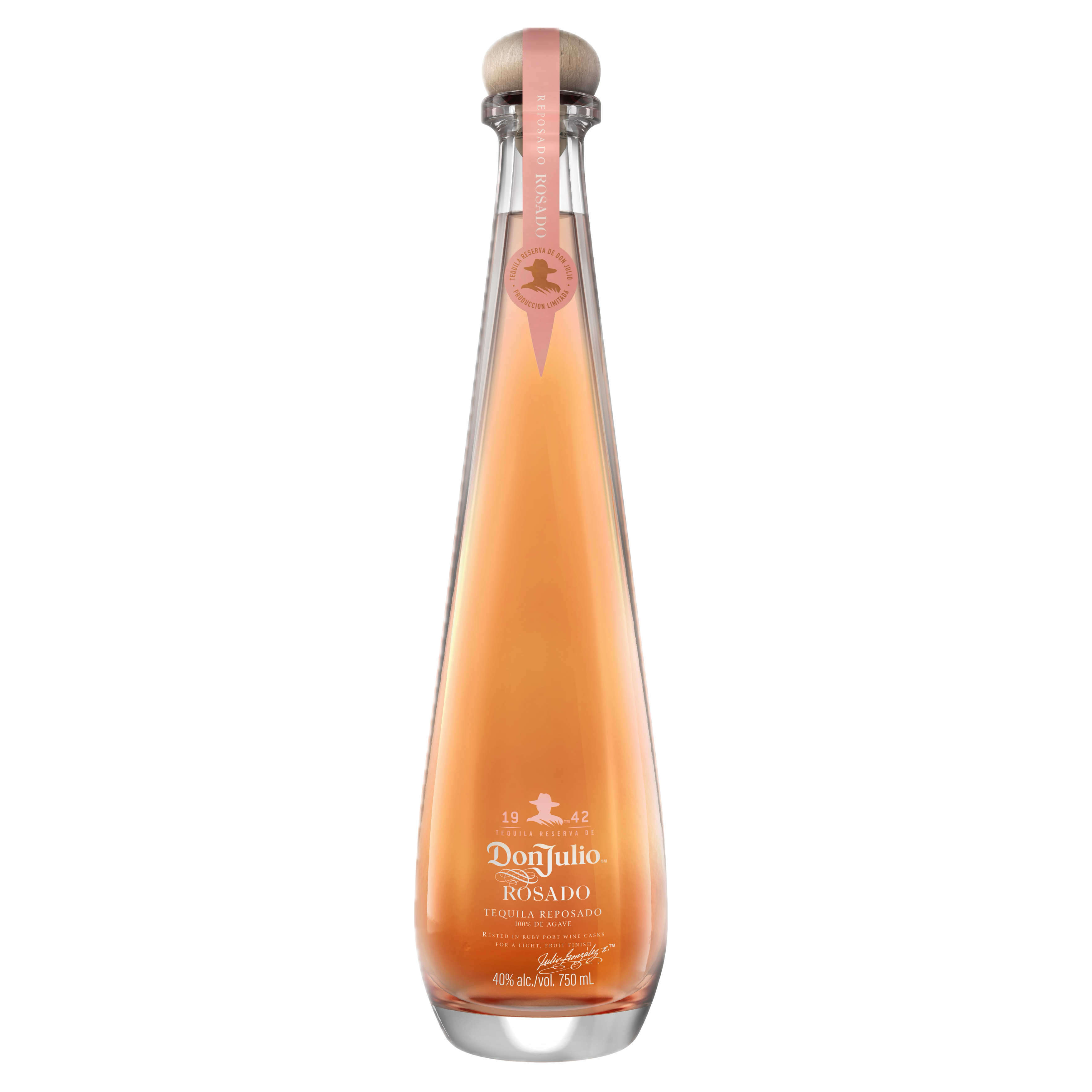 A tall, clear bottle of Don Julio 1942 Rosado tequila with a pink ribbon and wooden cap, containing light pink liquid, displayed on a white background.