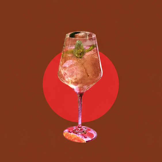 A wine glass with a pink drink and ice, garnished with mint. Text reads: Wine Glass. Use it for: wine, spritzes, frozen cocktails.