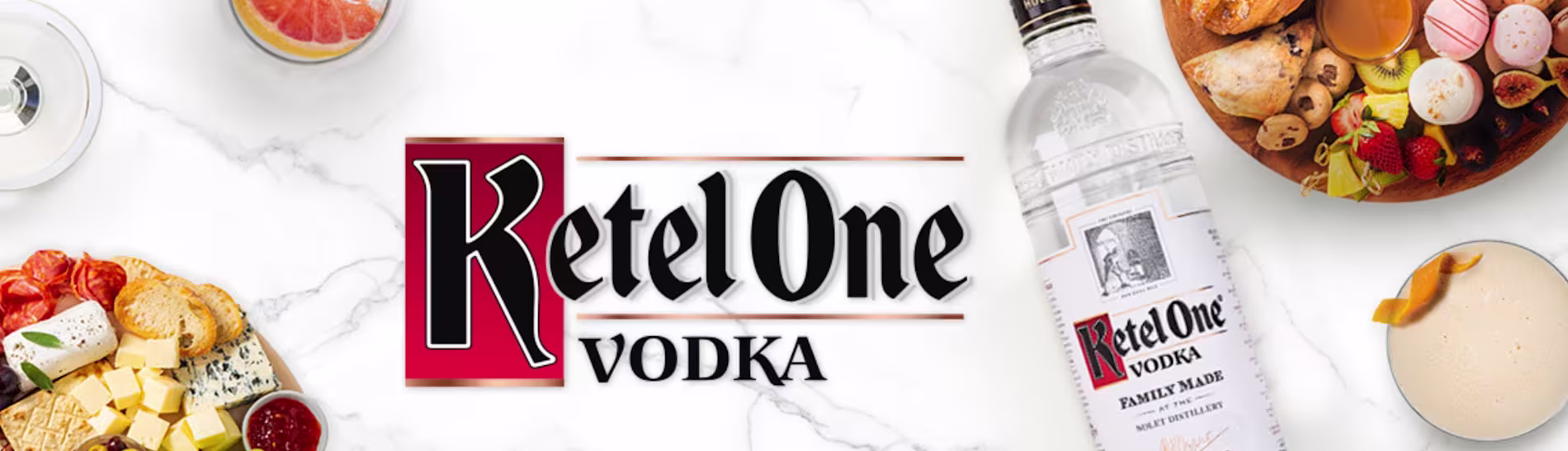 Flatlay image of Ketel One vodka and snacks