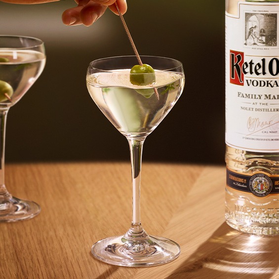 Ketel One Dirty Martini in a glass with an olive