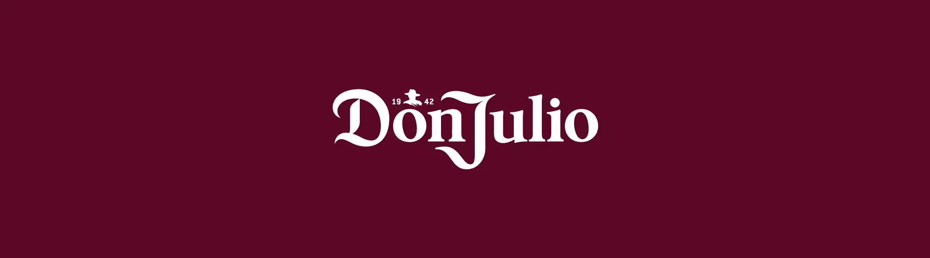 Don Julio tequila logo on a maroon background, featuring the text 1942 Tequila Reserva de Don Julio with a silhouette of a man in a hat above the text.