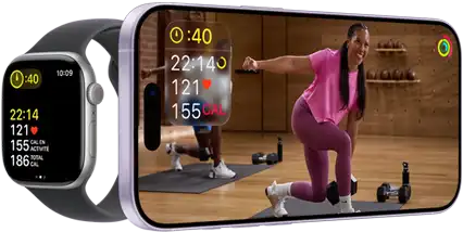 Apple Watch à côté d’un iPhone affichant une séance Apple Fitness+