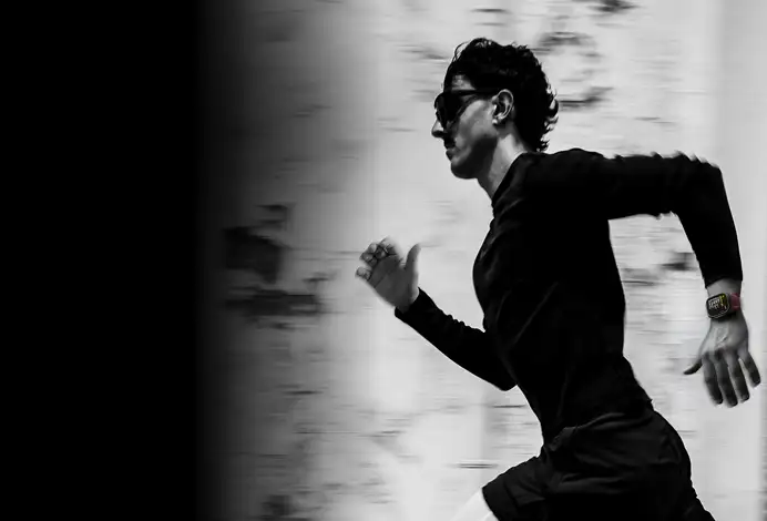 A person running while wearing Apple Watch Ultra 4