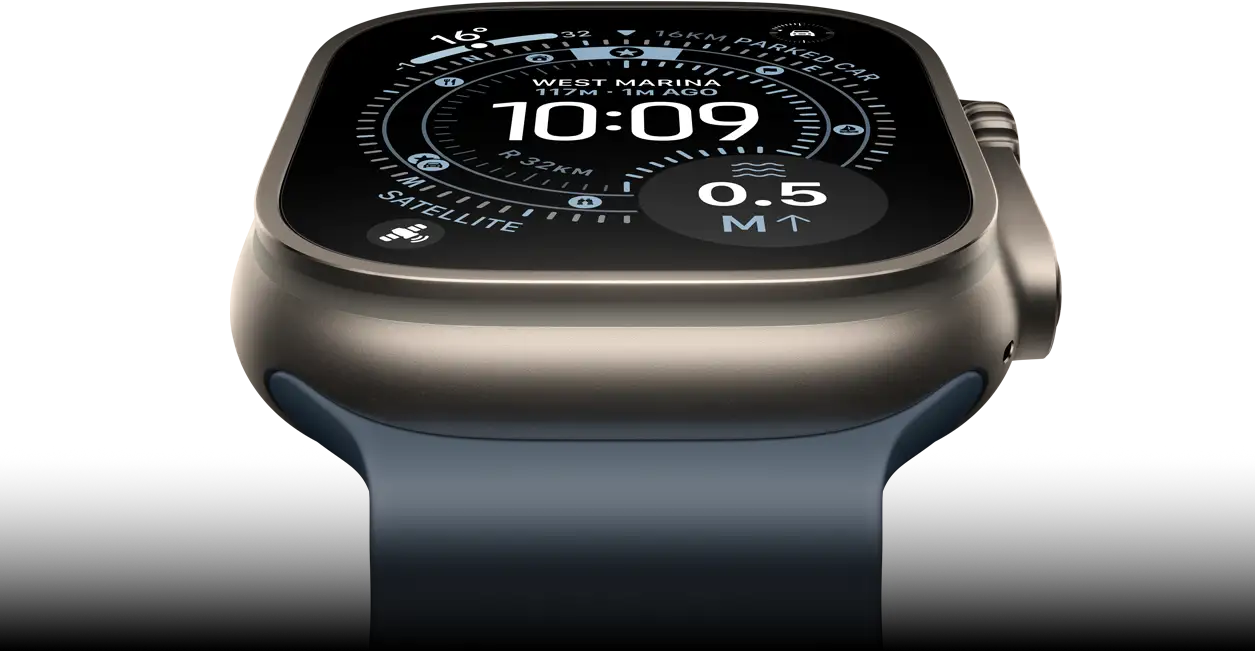 Apple Watch Ultra 3 tilted forward, natural titanium case, compass on Orienteering watch face, anchor blue Ocean Band