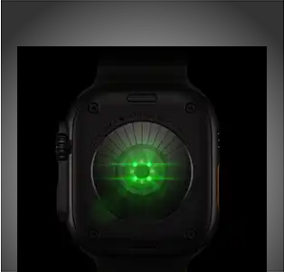 Back of Apple Watch Ultra 4, titanium case, black colour, multiple round sensors with glowing green LED lights