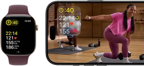 Apple Watch next to iPhone with Apple Fitness+ class on screen
