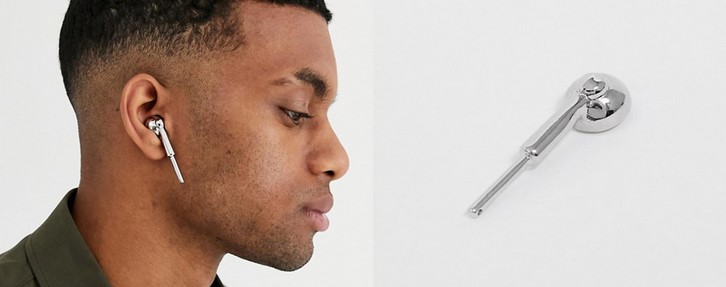 Asos shows off their faux-hearable, a silver accessory shaped like an Apple AirPod.