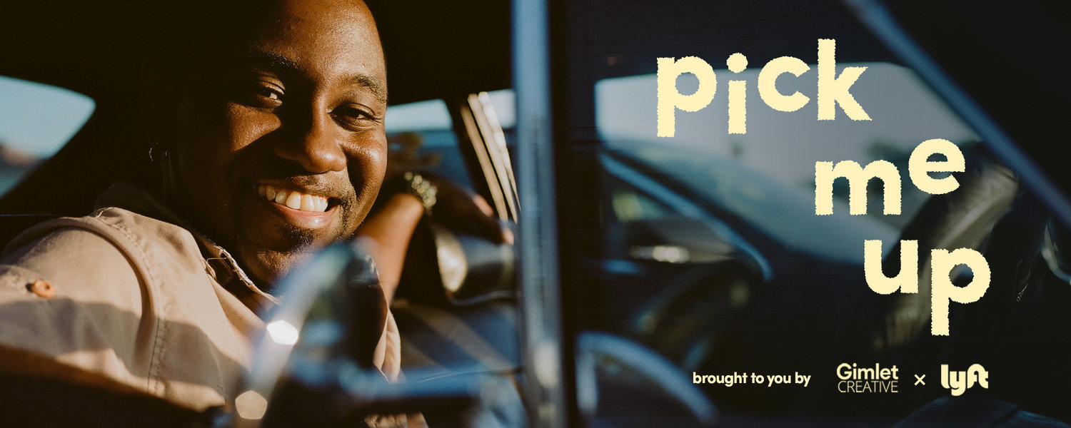 A photo of driver and author Marcelis, smiling in his car.
