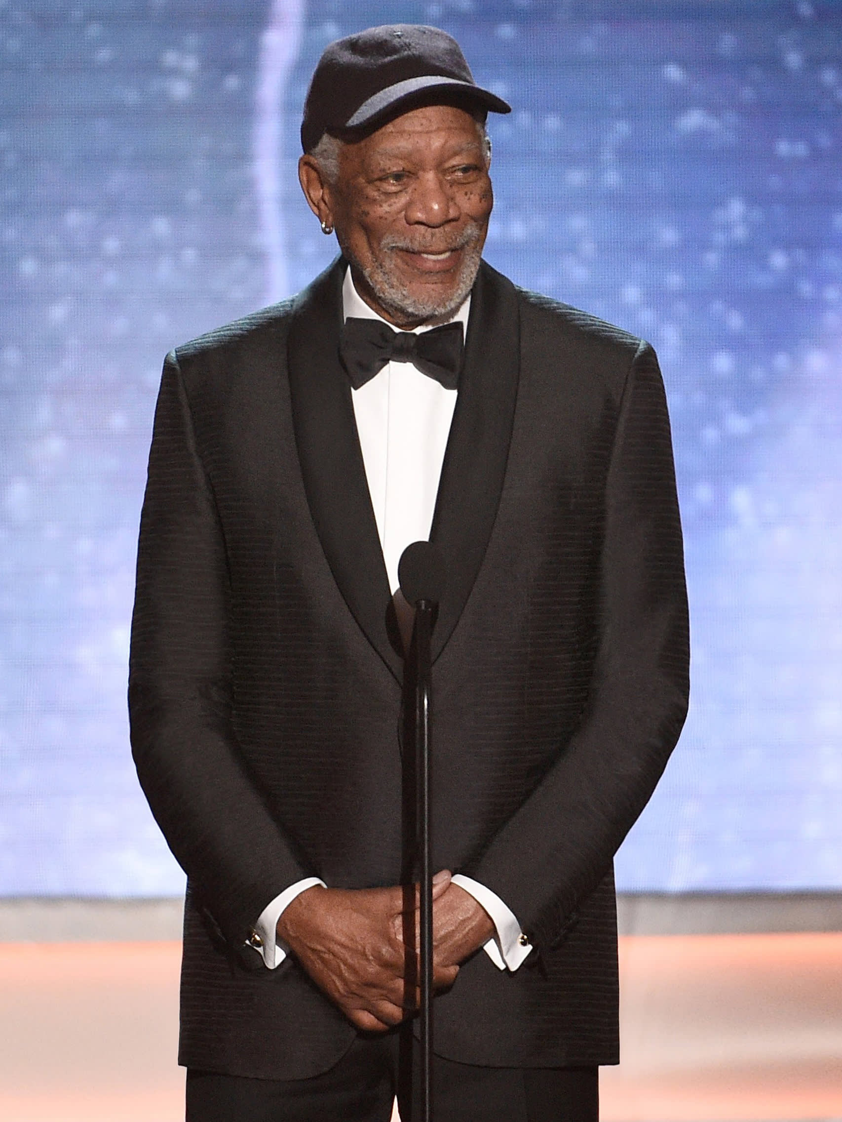 Morgan Freeman wearing a Brioni bespoke black tuxedo
