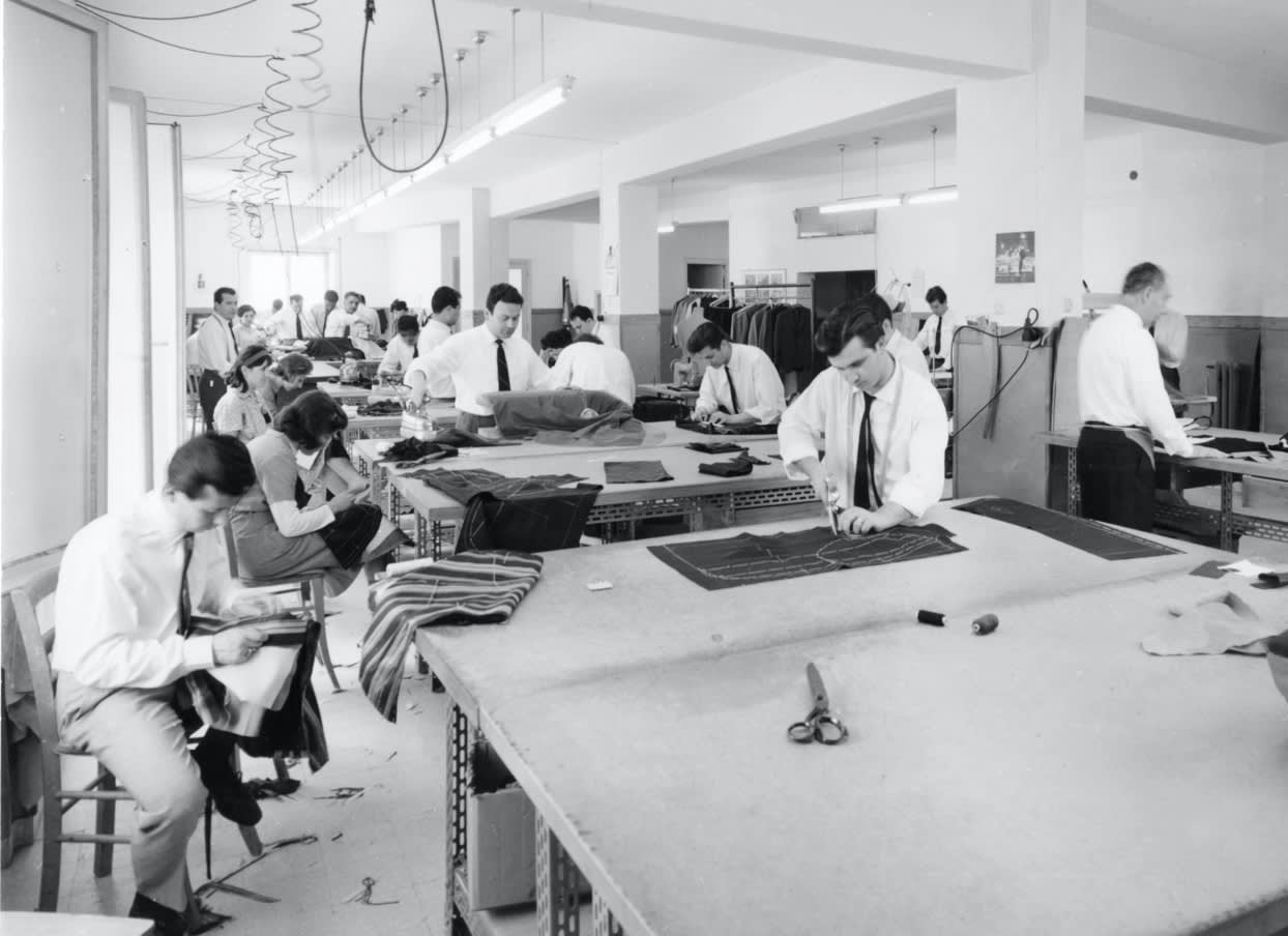 Tailors and seamstresses at work in the Brioni atelier in Rome, 1960s