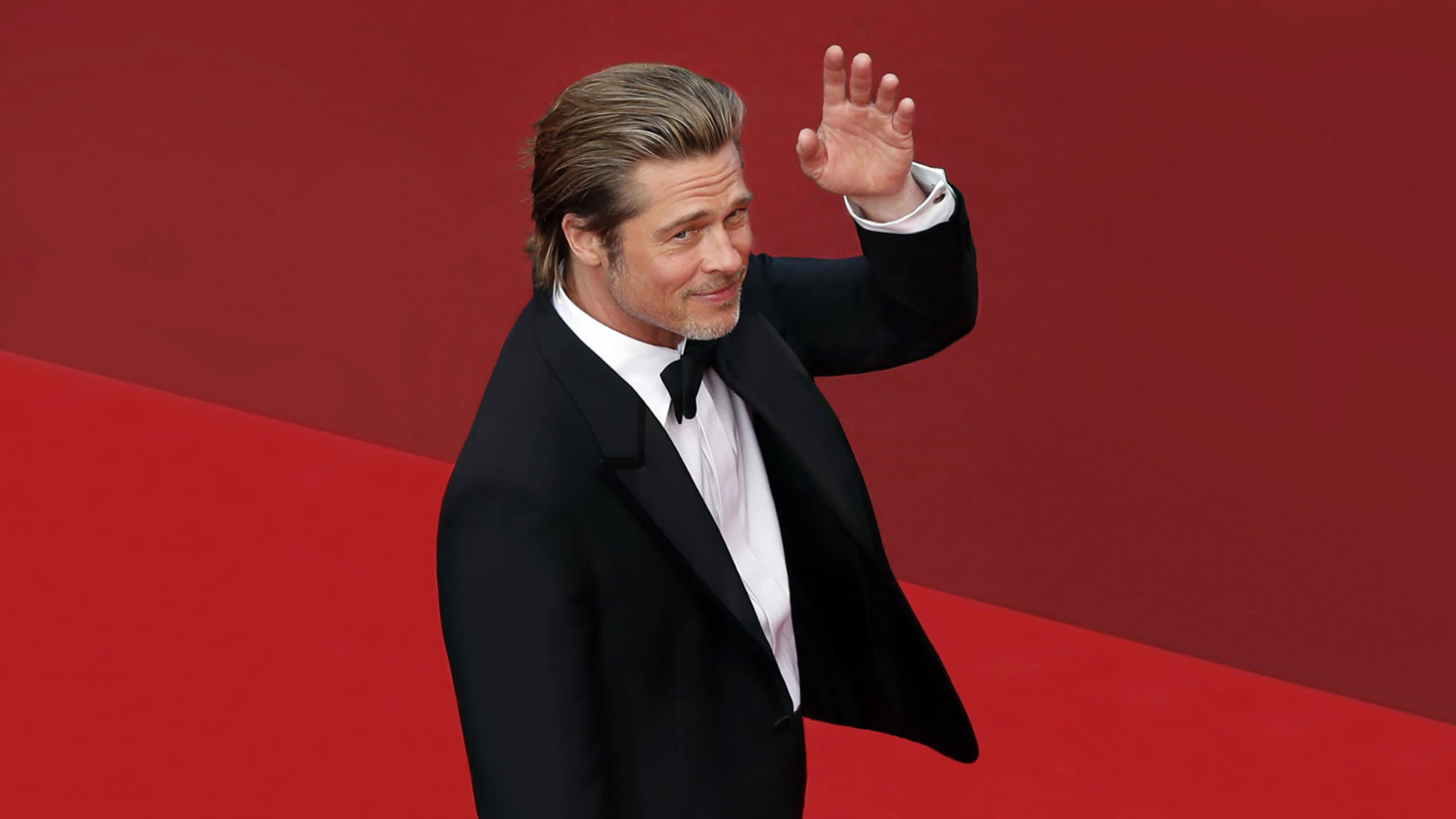 Brioni ambassador Brad Pitt wearing a Brioni bespoke black tuxedo