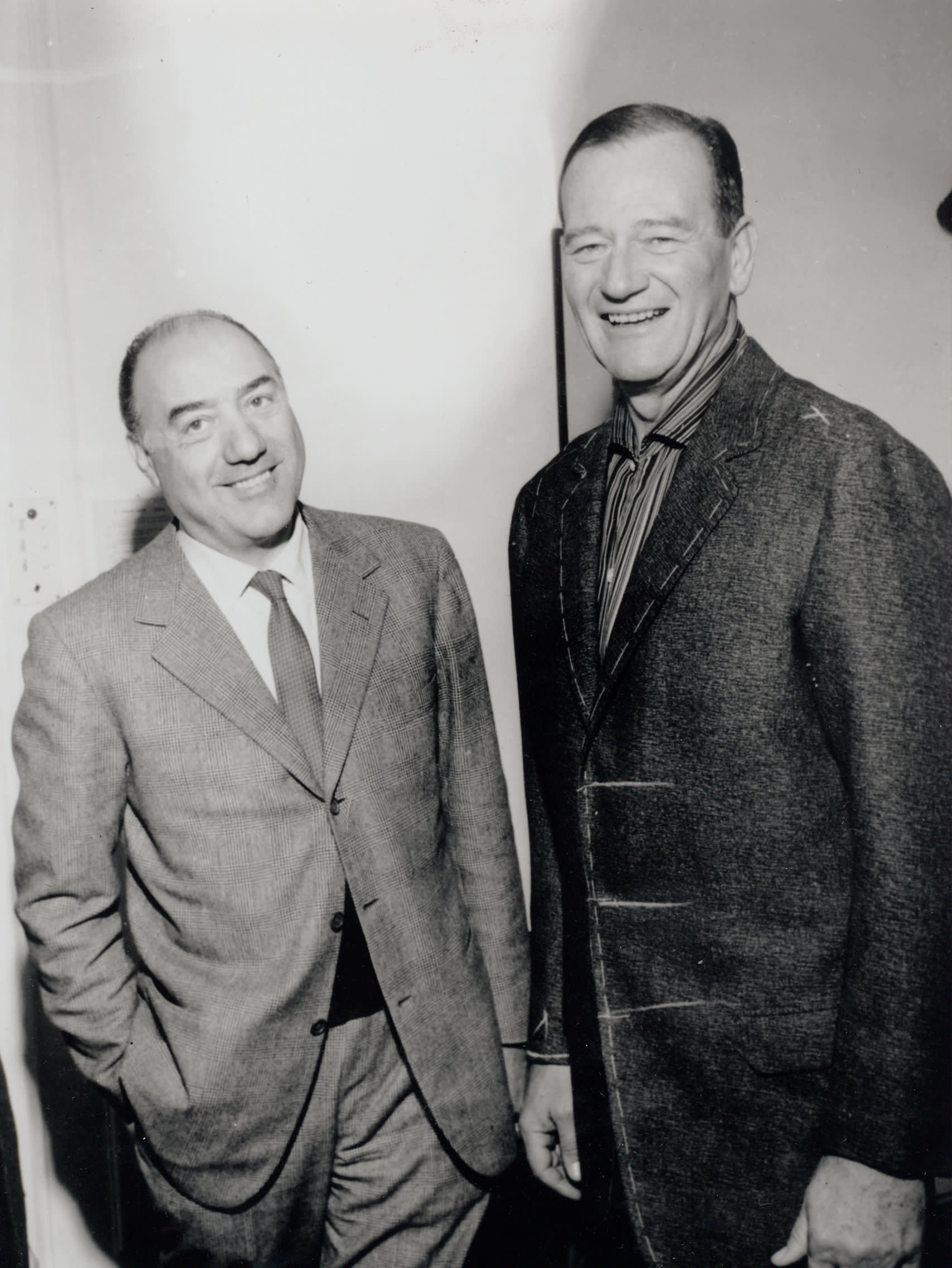 Brioni founder Gaetano Savini with American actor John Wayne