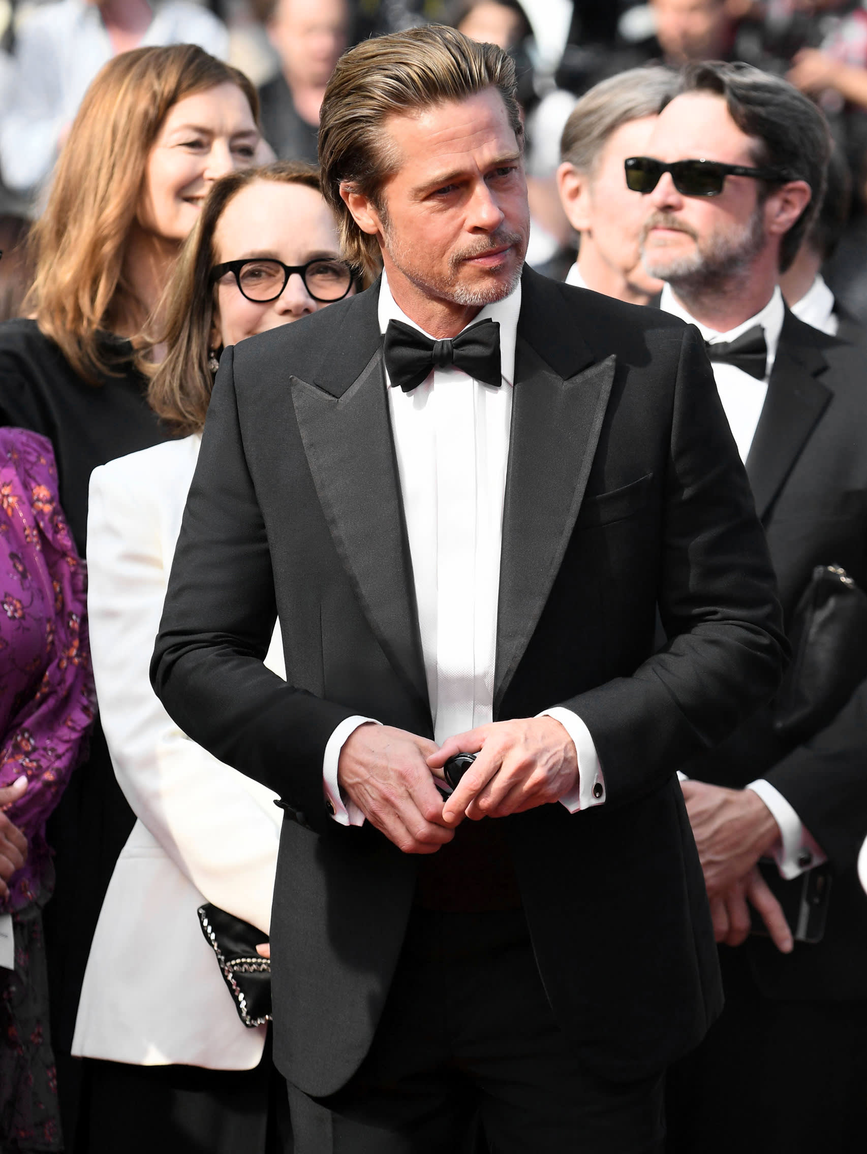 Brad Pitt wearing a Brioni bespoke black tuxedo