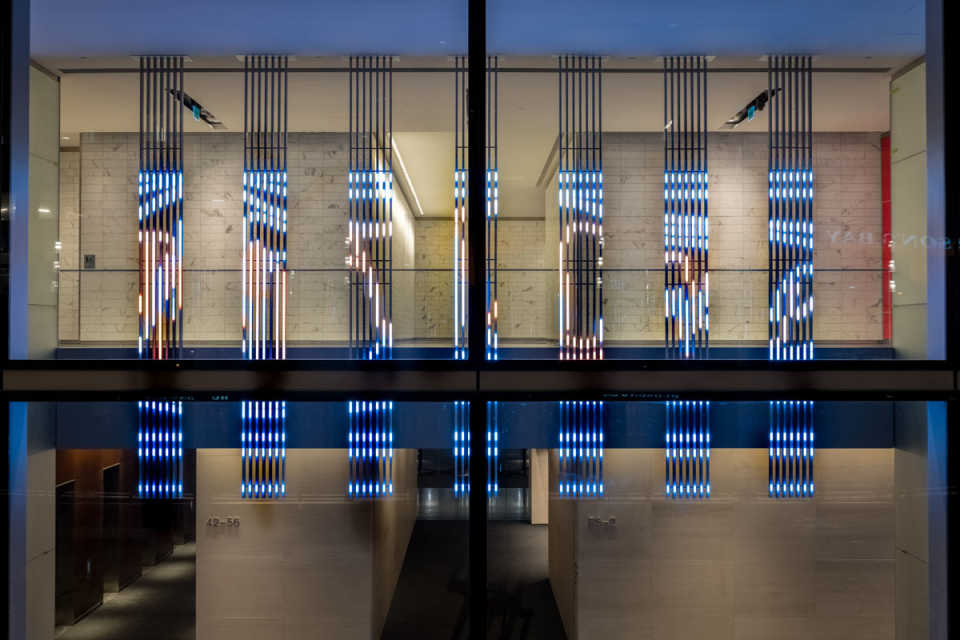 The LED panels create an intricate light display  which spills out onto the plaza 