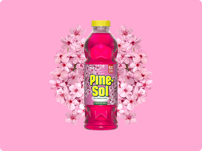 Bottle of Pine-Sol Cherry Blossom cleaner with cherry blossoms in background, on pink gradient.