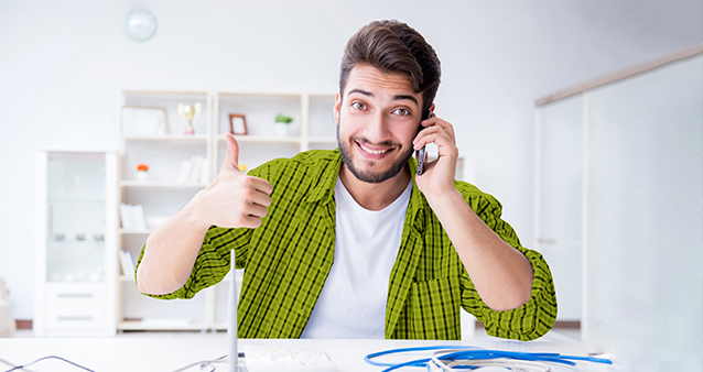 man-on-phone-router-on-table