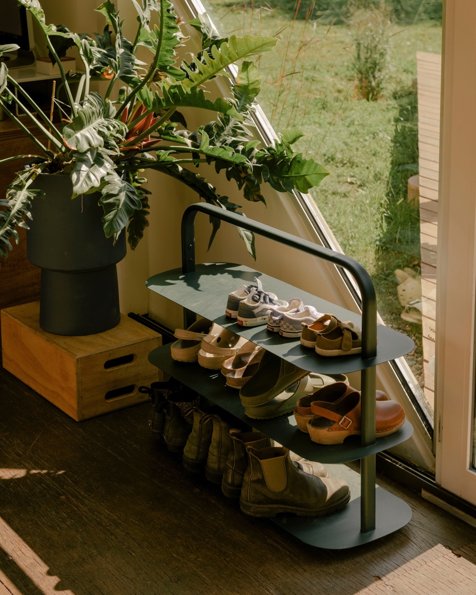 An open spaces shoe rack.