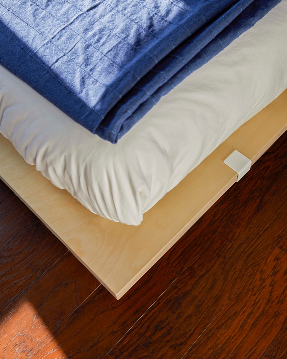 Hotel style duvet cover tucked on a Floyd bed.