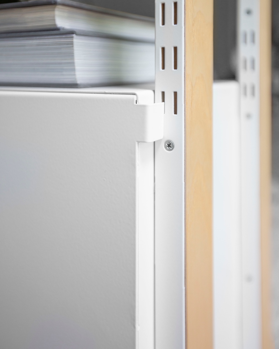The Cabinet integrates into the existing track system, which makes it easily adjustable.